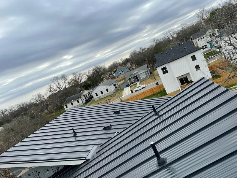 Standing seam metal roof panels with vents for Skylight Repair in Broussard